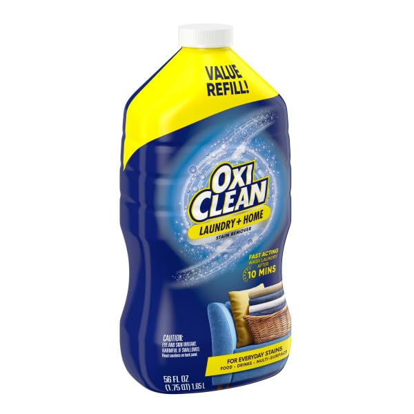 OxiClean botella colocada sobre lavadora lista para rellenar spray