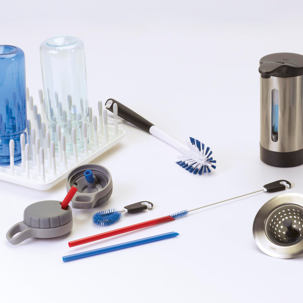 OXO Good Grips anillo organizador con los tres cepillos acoplados, evita extraviarlos