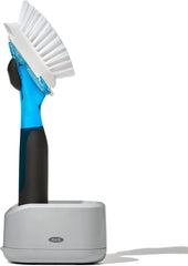 OXO Good Grips vista frontal del cepillo dispensador, diseño ergonómico y control