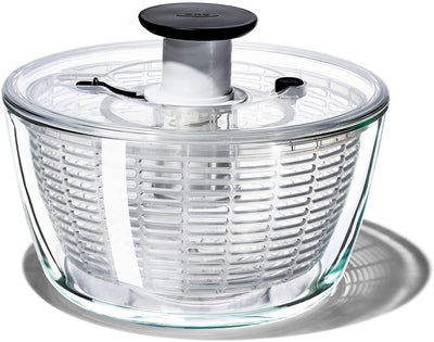 OXO glass salad spinner front view shows elegant bowl and easy serving