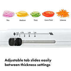 OXO mandoline food holder detail demonstrating built-in finger protection