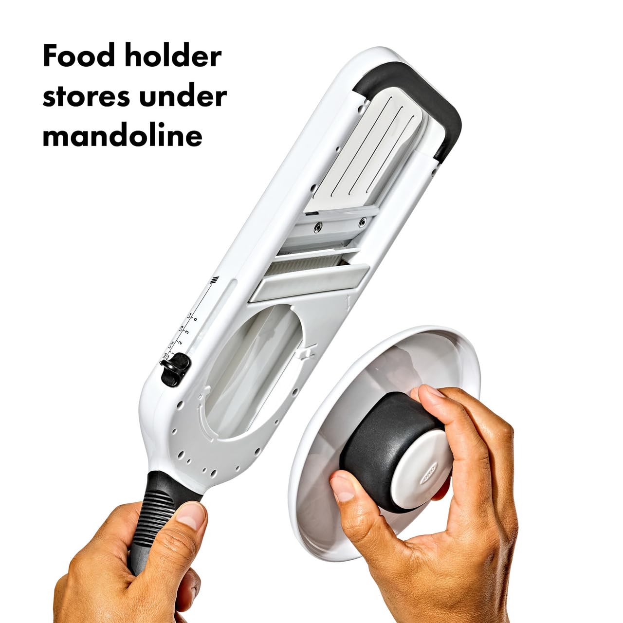 OXO mandoline in use slicing a potato delivering uniform, quick results