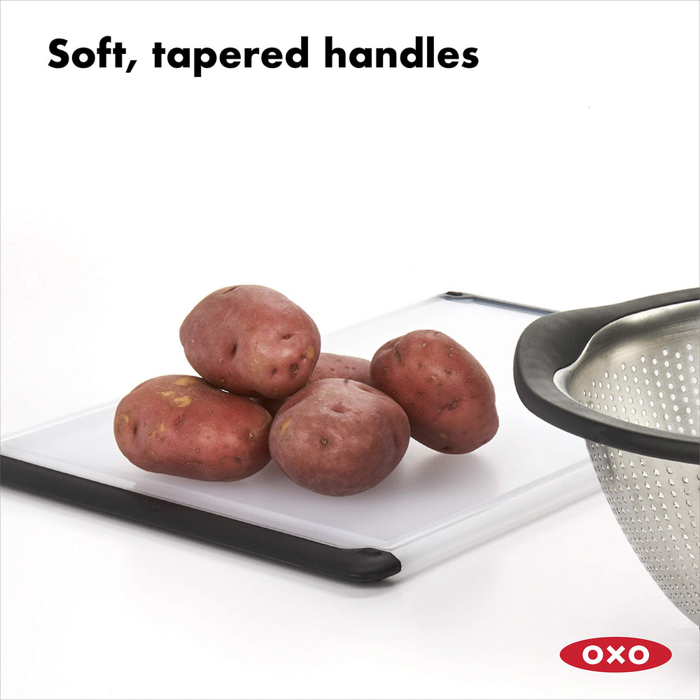 OXO Good Grips pour-corner action draining juice without spilling