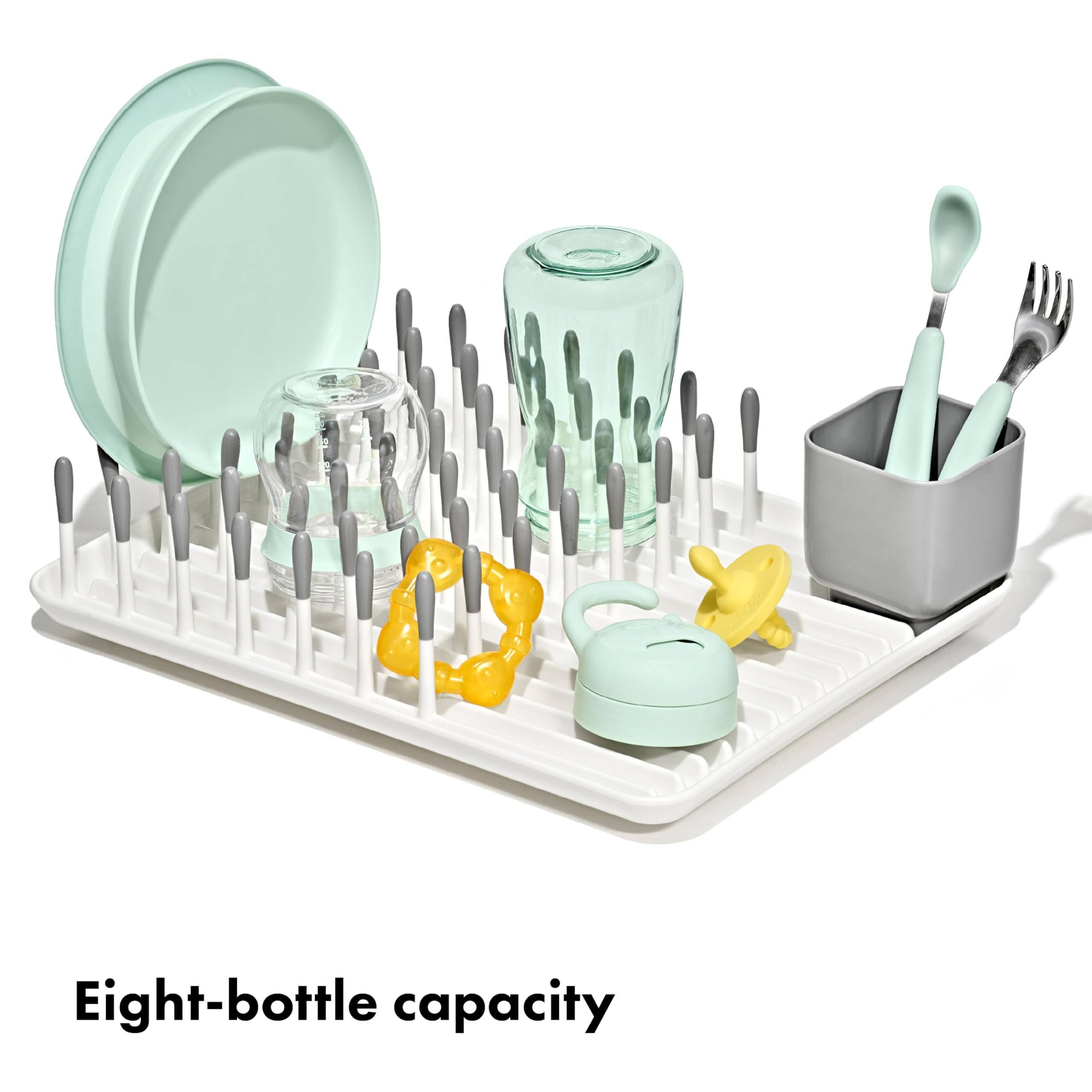 OXO Tot close-up of silicone-tipped tines protecting bottles from scratches