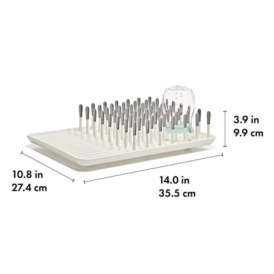 OXO Tot rack next to sink showing compact size for small countertop spaces