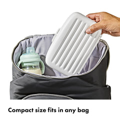 OXO Tot tray folded flat to show compact travel-ready profile and easy packing