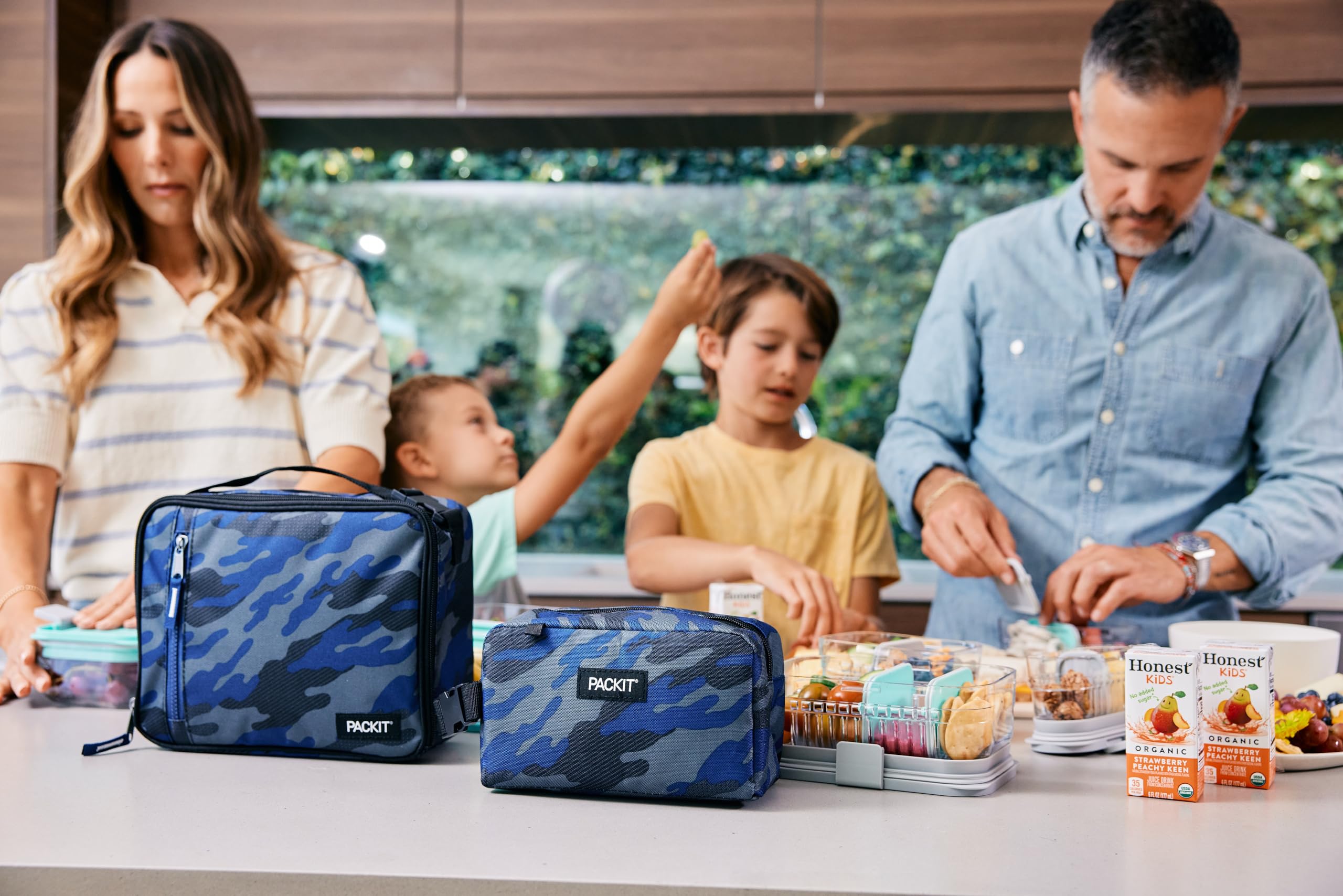 PackIt lonchera plegada en congelador para almacenamiento compacto