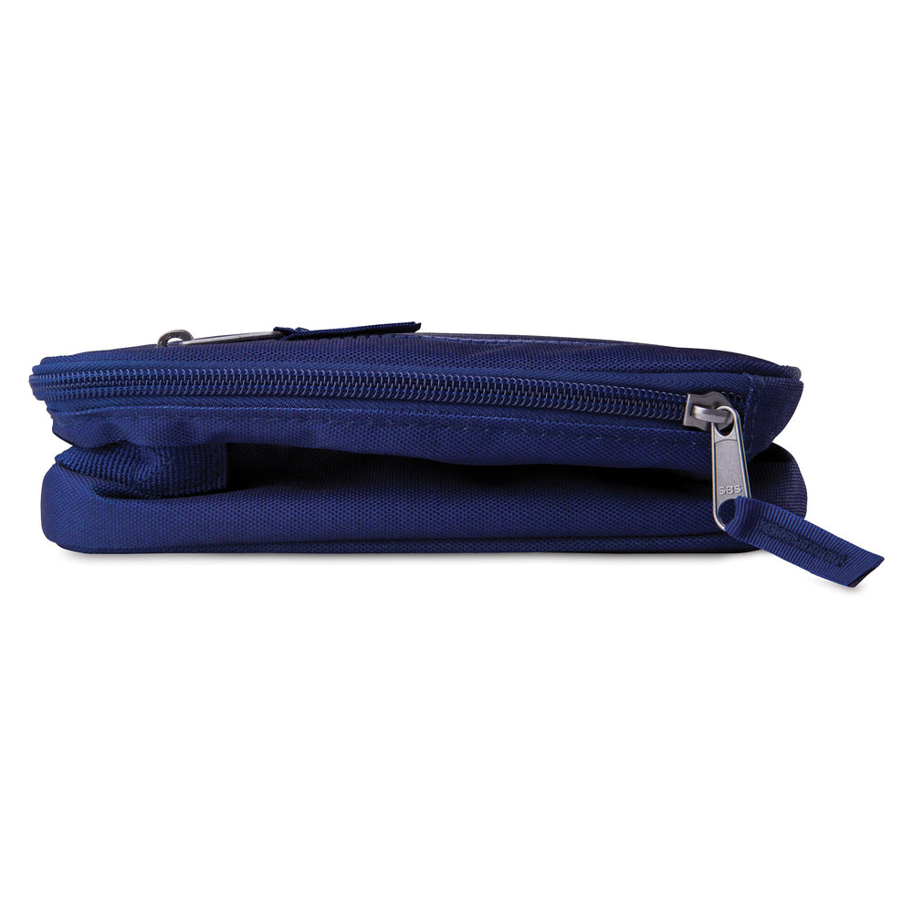 PackIt collapsed bag beside notebook showing compact storage benefit