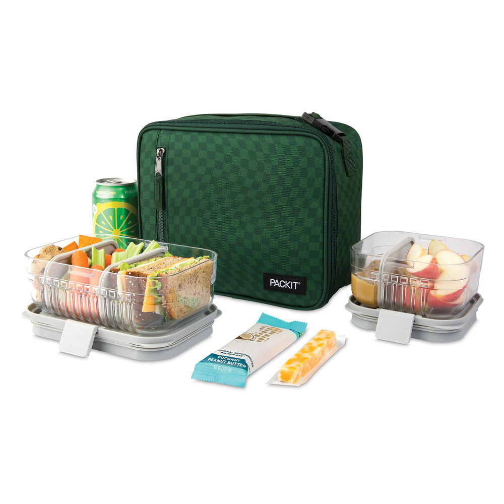 PackIt lonchera colocada dentro de una mochila demostrando compatibilidad