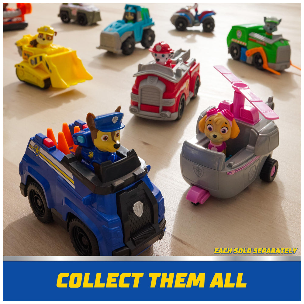 Paw Patrol ATV comparación de escala con mano para tamaño real