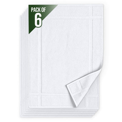 Pearl Linens front view of six-pack white bath mat towels showing size and packaging benefit