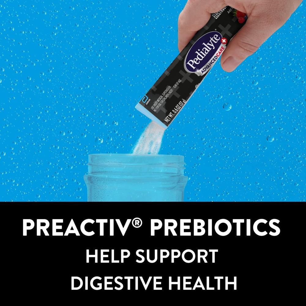 Pedialyte AdvancedCare Plus packet next to hand to show single-serve size and portability
