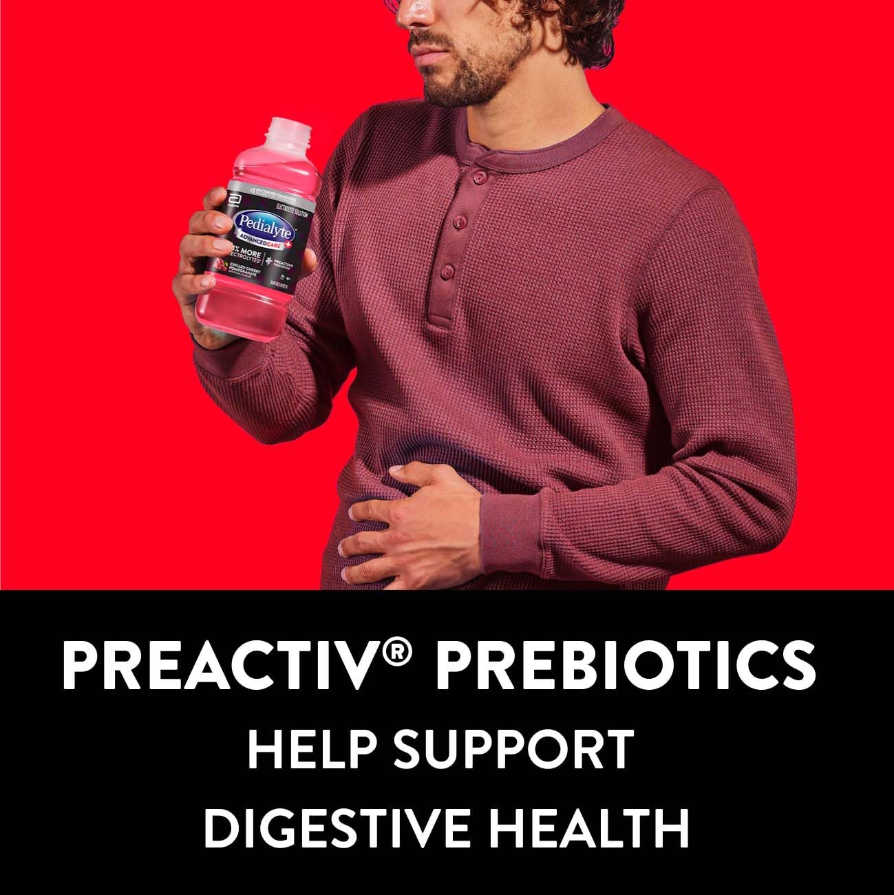 Pedialyte bottle in hand to show portable size and convenient rehydration on-the-go