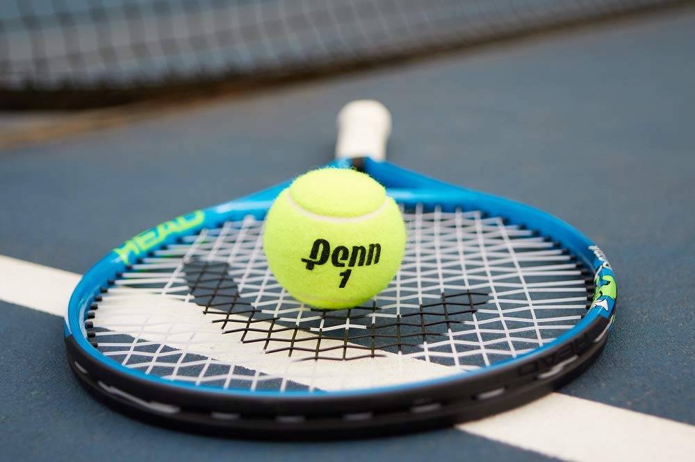 Penn balls in play on hard court showing consistent bounce benefit