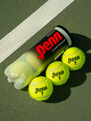 Penn three-ball can beside racket for scale and convenience benefit