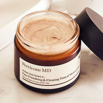 Perricone MD in a bathroom morning routine scene conveying effortless glow