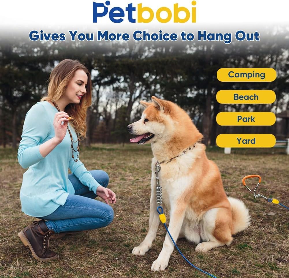Petbobi installed in lawn with dog showing tethered roaming space