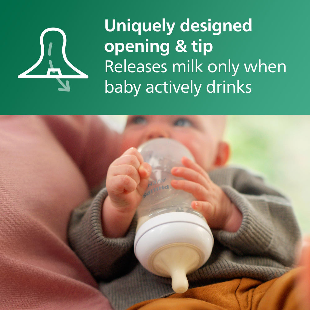 Philips Avent biberón en mano demostrando ergonomía para padres