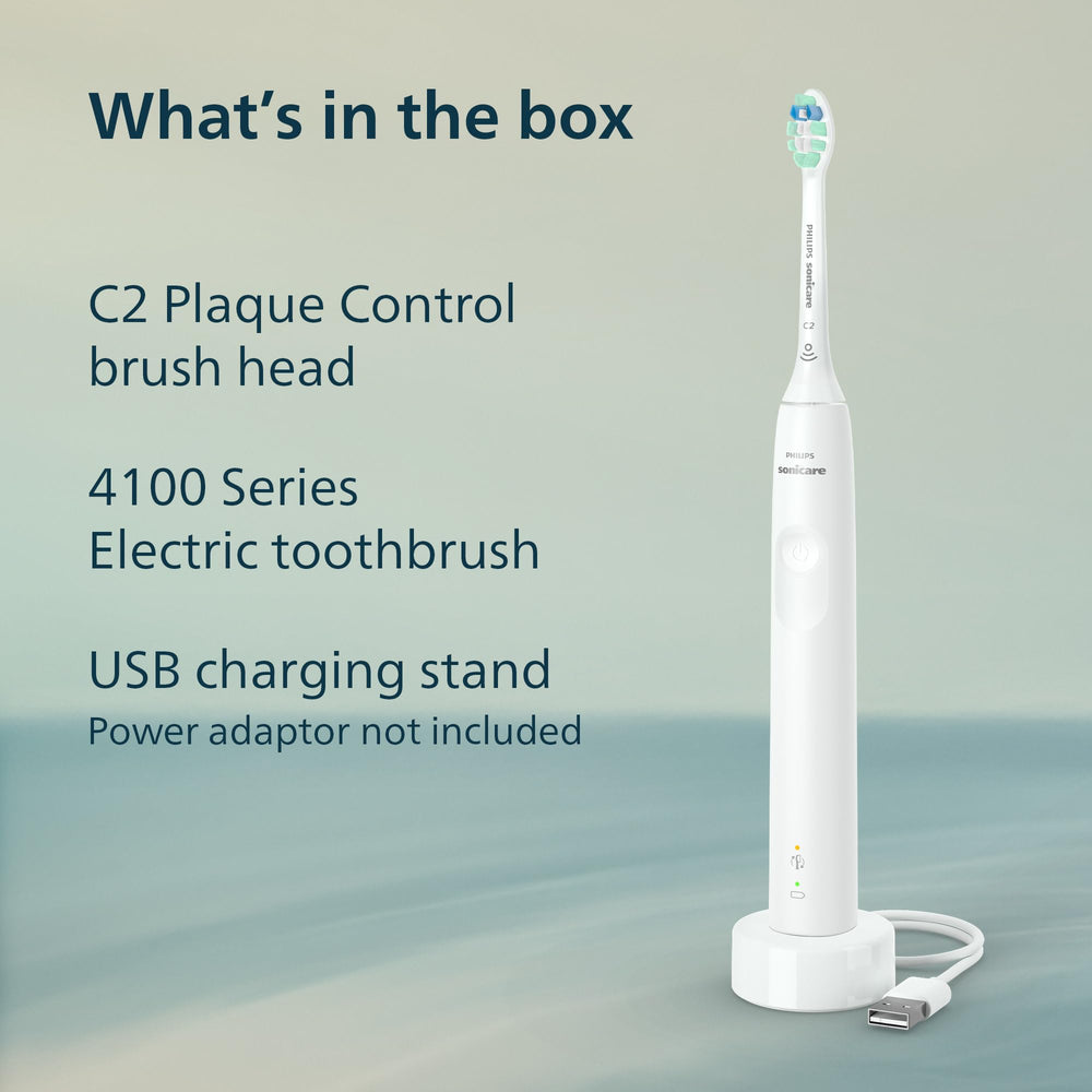 Philips Sonicare box opened with included brush head and USB cable, complete set