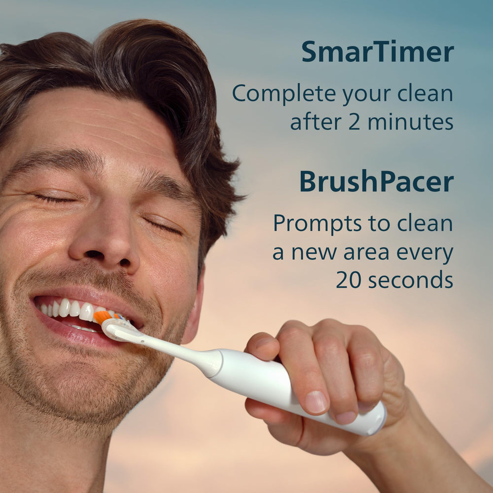 Philips Sonicare toothbrush held in hand to show size and 21-day battery convenience