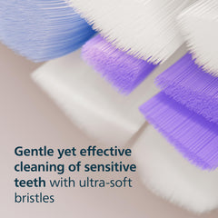 Philips Sonicare cabezal en uso demostrando limpieza entre dientes