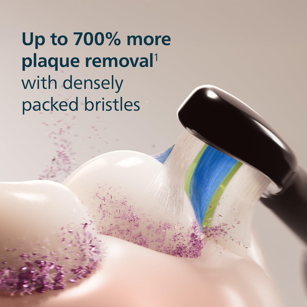 Philips Sonicare brush head clicked onto handle demonstrating easy replacement