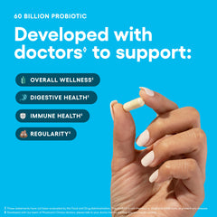 Physician's CHOICE polvo prebiótico orgánico cerca del frasco que alimenta microbiota