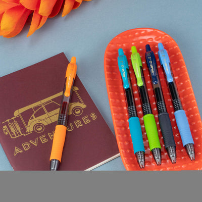PILOT G2 pen in hand writing on notebook highlighting comfortable control