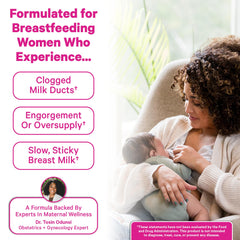 Pink Stork softgel en mano para comparar tamaño y facilidad de tragar