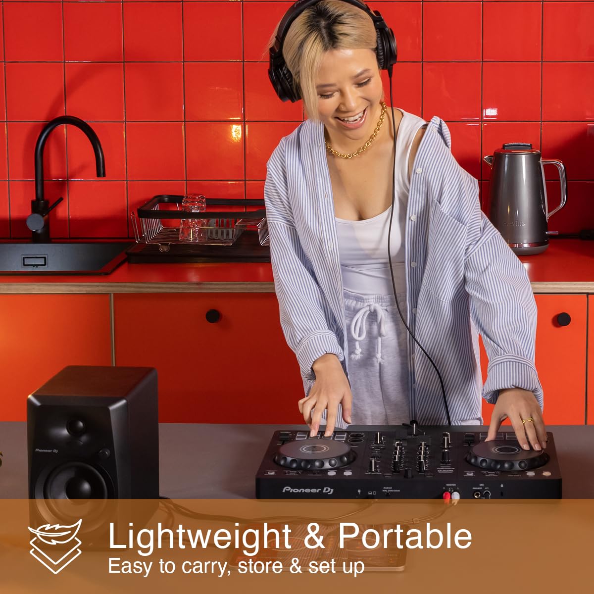 Pioneer DJ DDJ-FLX4 paired to smartphone via Bluetooth for mobile DJ sets and portability