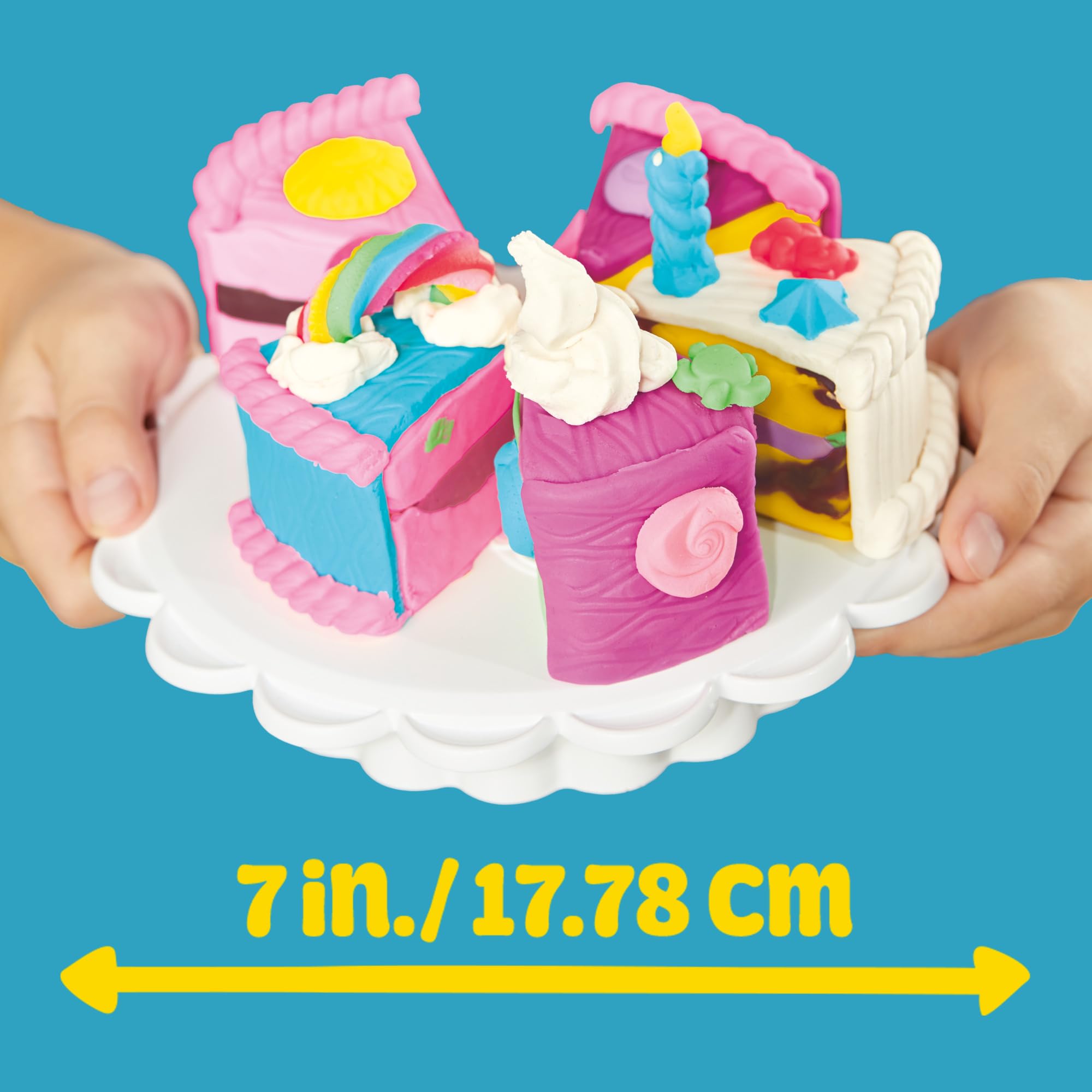Decorating tools and small molds laid out, illustrating Play‑Doh toppings and customization options