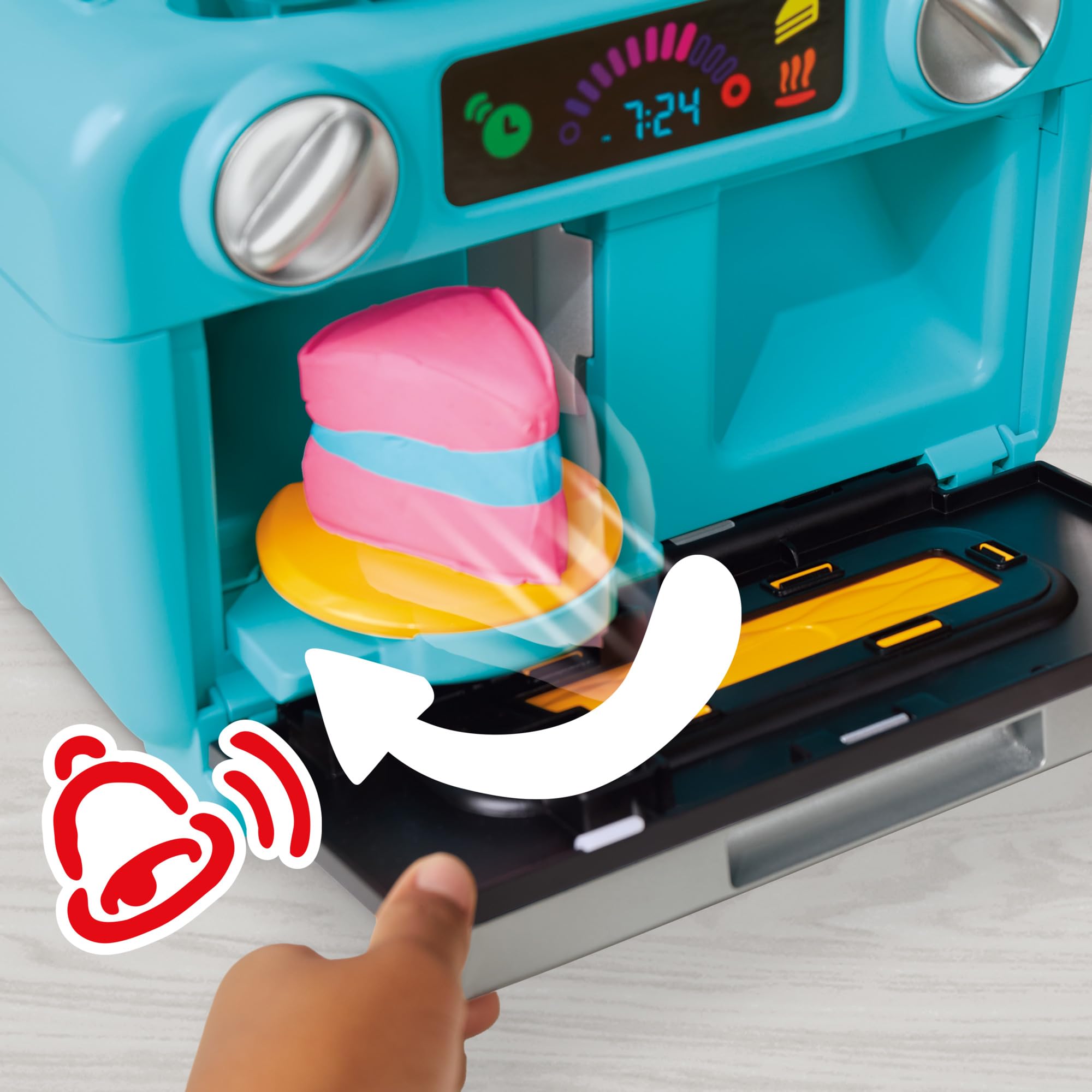 Play‑Doh toy oven in action with a slice spinning out, demonstrating easy slice creation