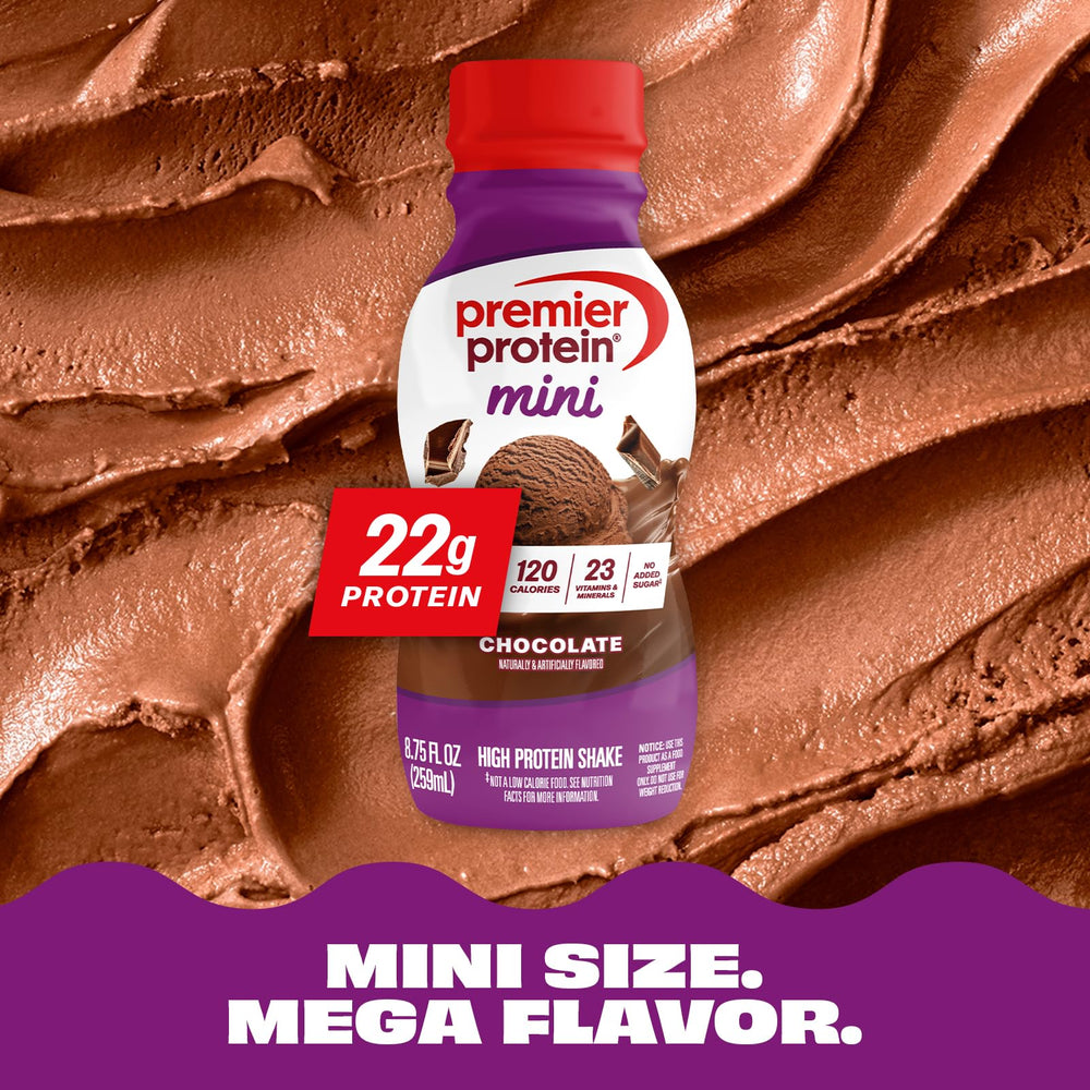 Person holding Premier Protein MINI chocolate bottle on the go for quick fuel