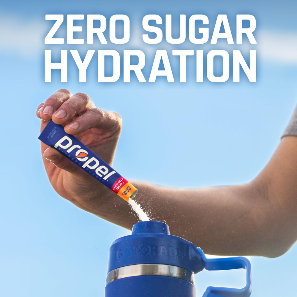 Propel mixed drink in clear glass showing dissolved powder and refreshing hydration benefit