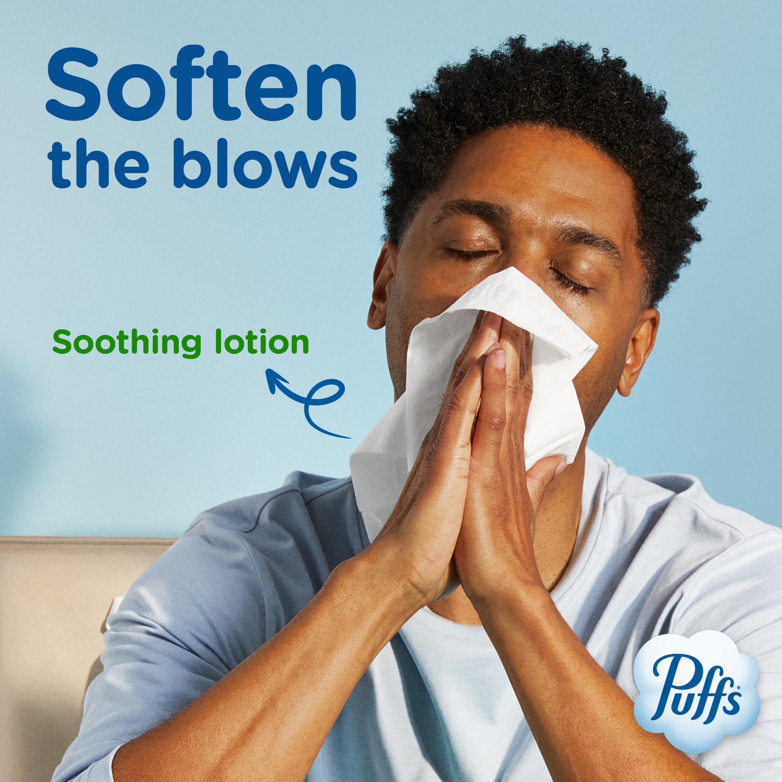 Caja Puffs abierta con pañuelos saliendo para extracción fácil