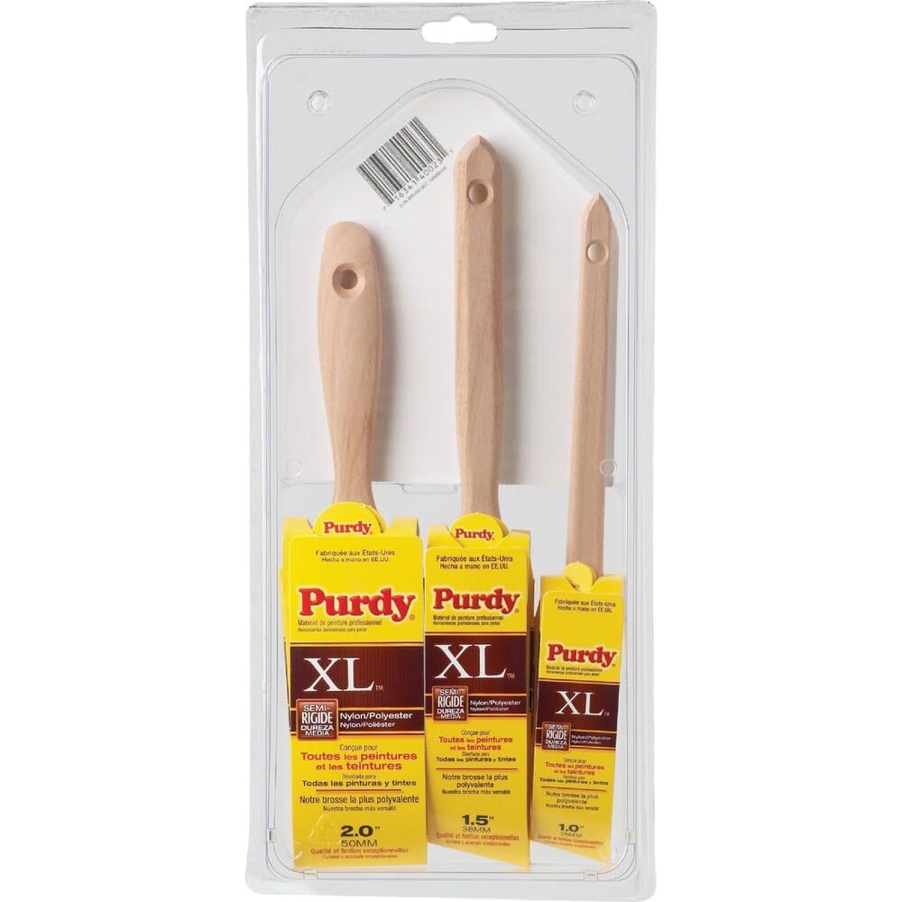 Purdy escala de tamaño junto a mano para referencia ergonómica