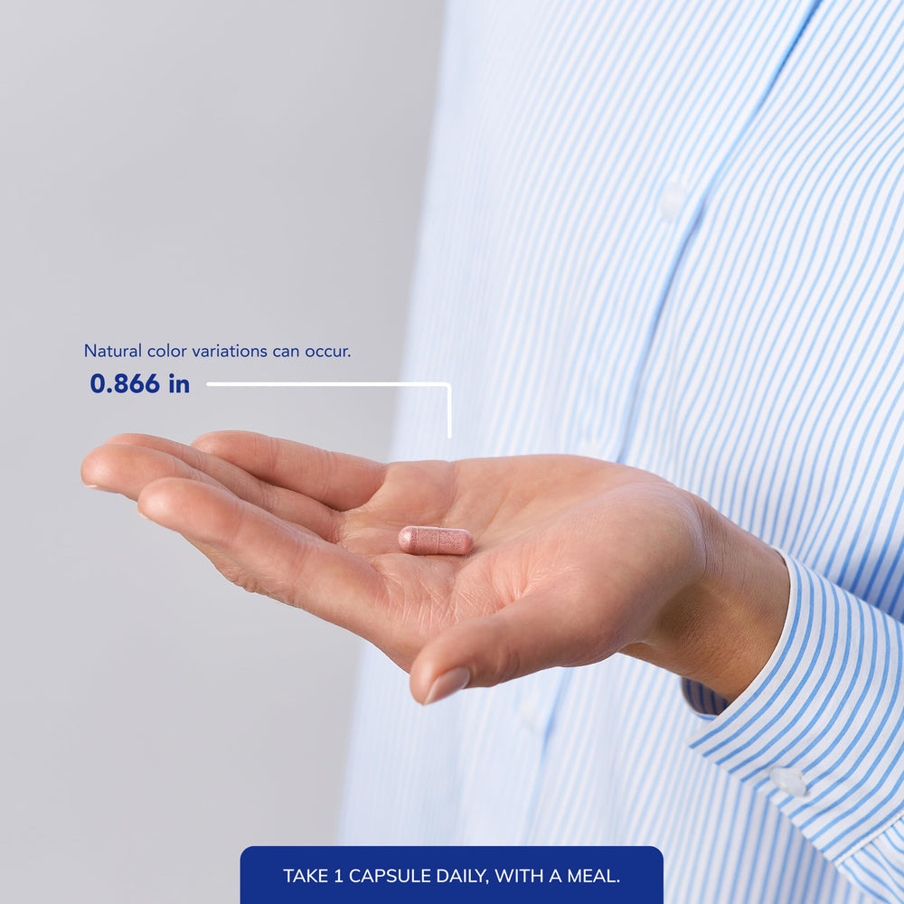 Pure Encapsulations capsules in hand showing size and easy daily dosing