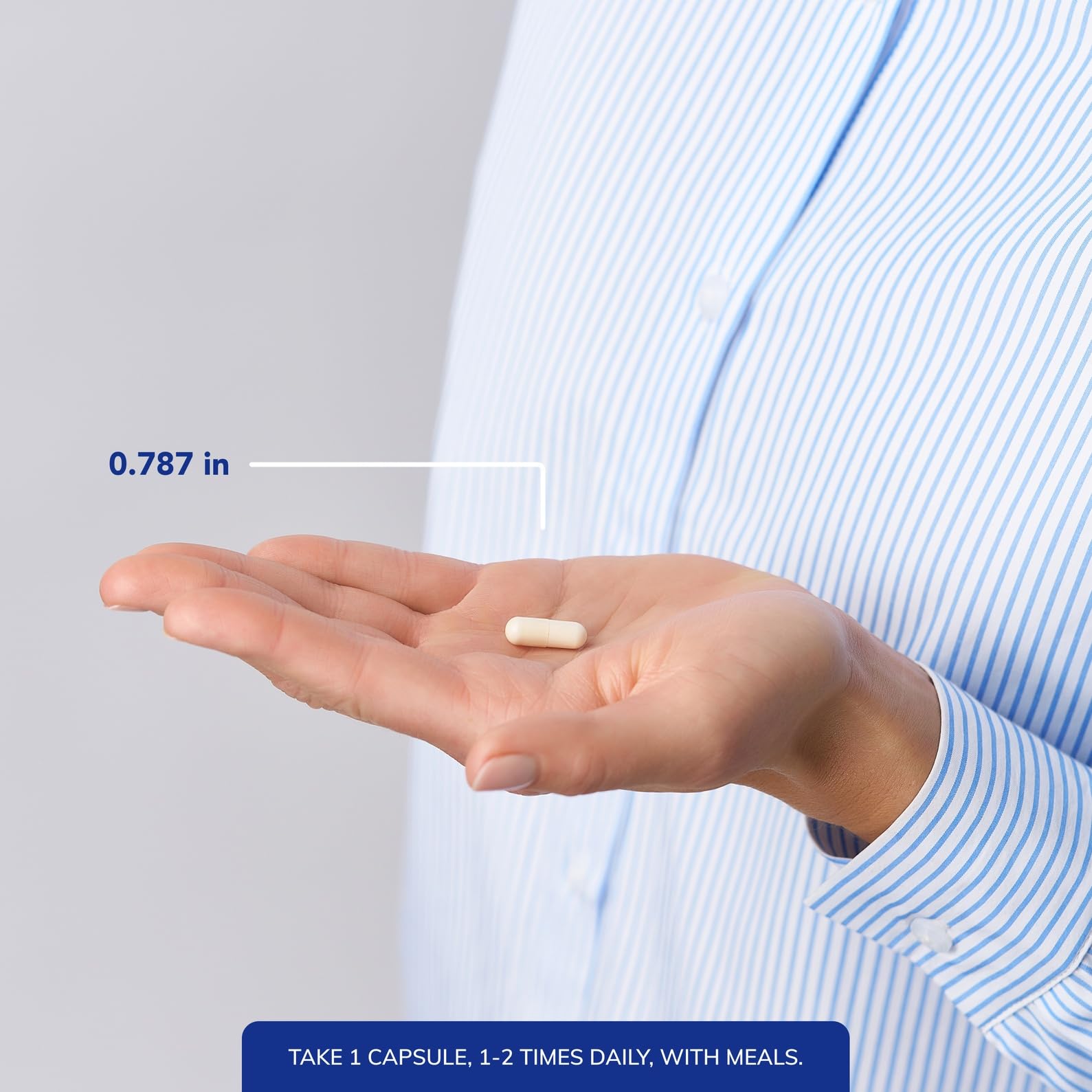 Pure Encapsulations serving size in hand showing scale and recommended dosing benefit