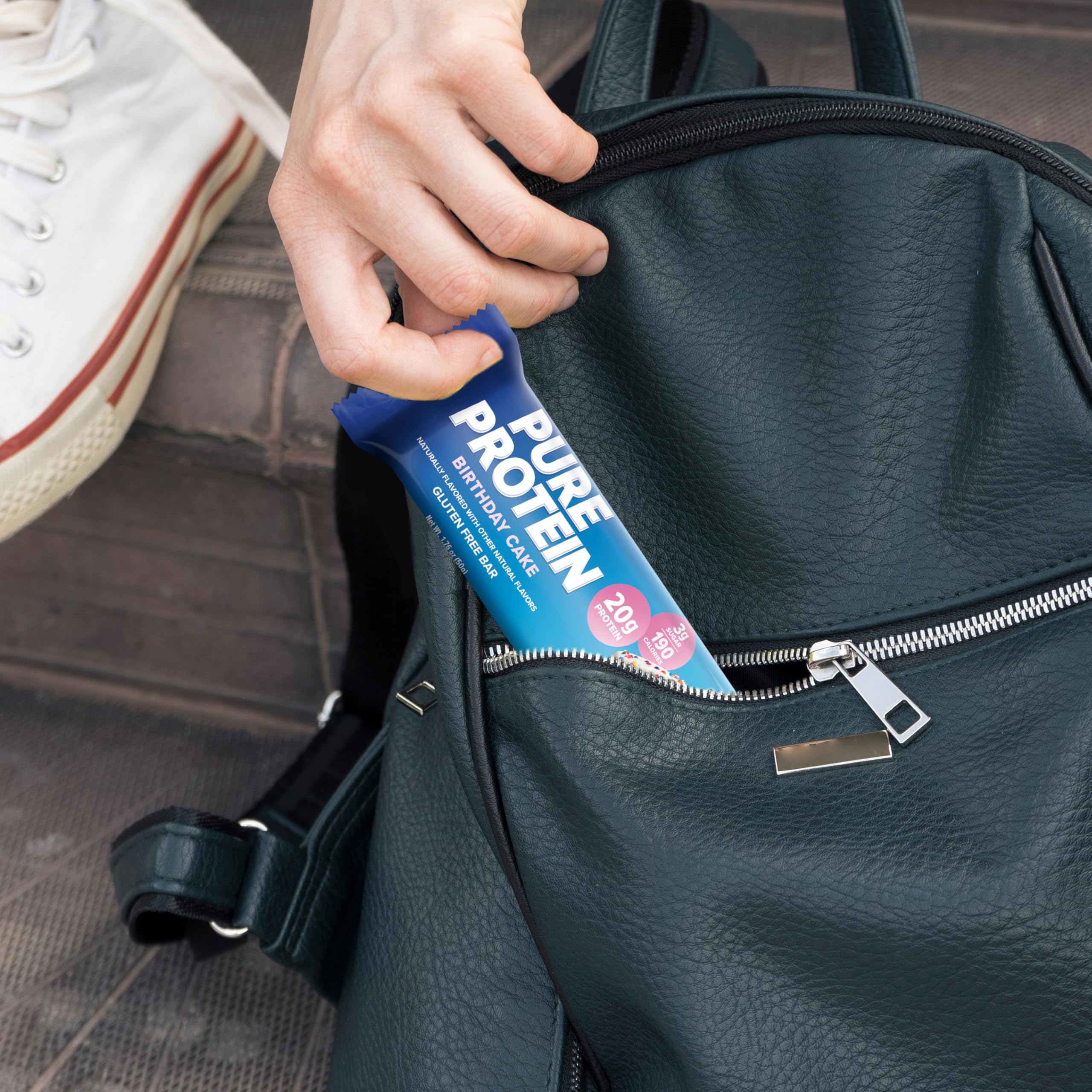 Pure Protein bar in a gym bag for on-the-go energy and recovery