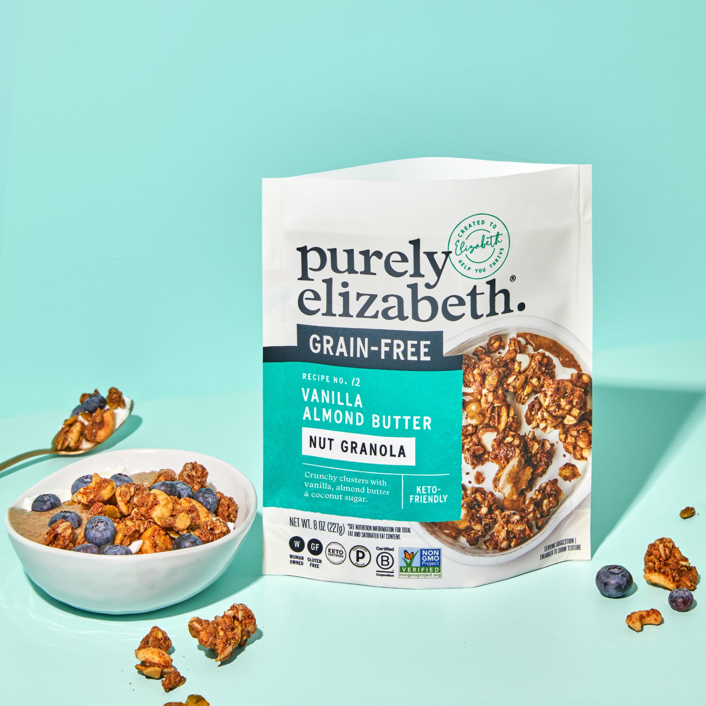 Purely Elizabeth spoonful over bowl with milk illustrating cereal-style use
