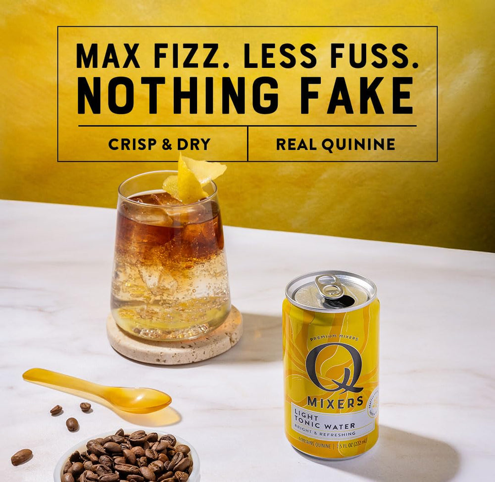 Q MIXERS cans in a picnic setting, perfect for outdoor gatherings without glass