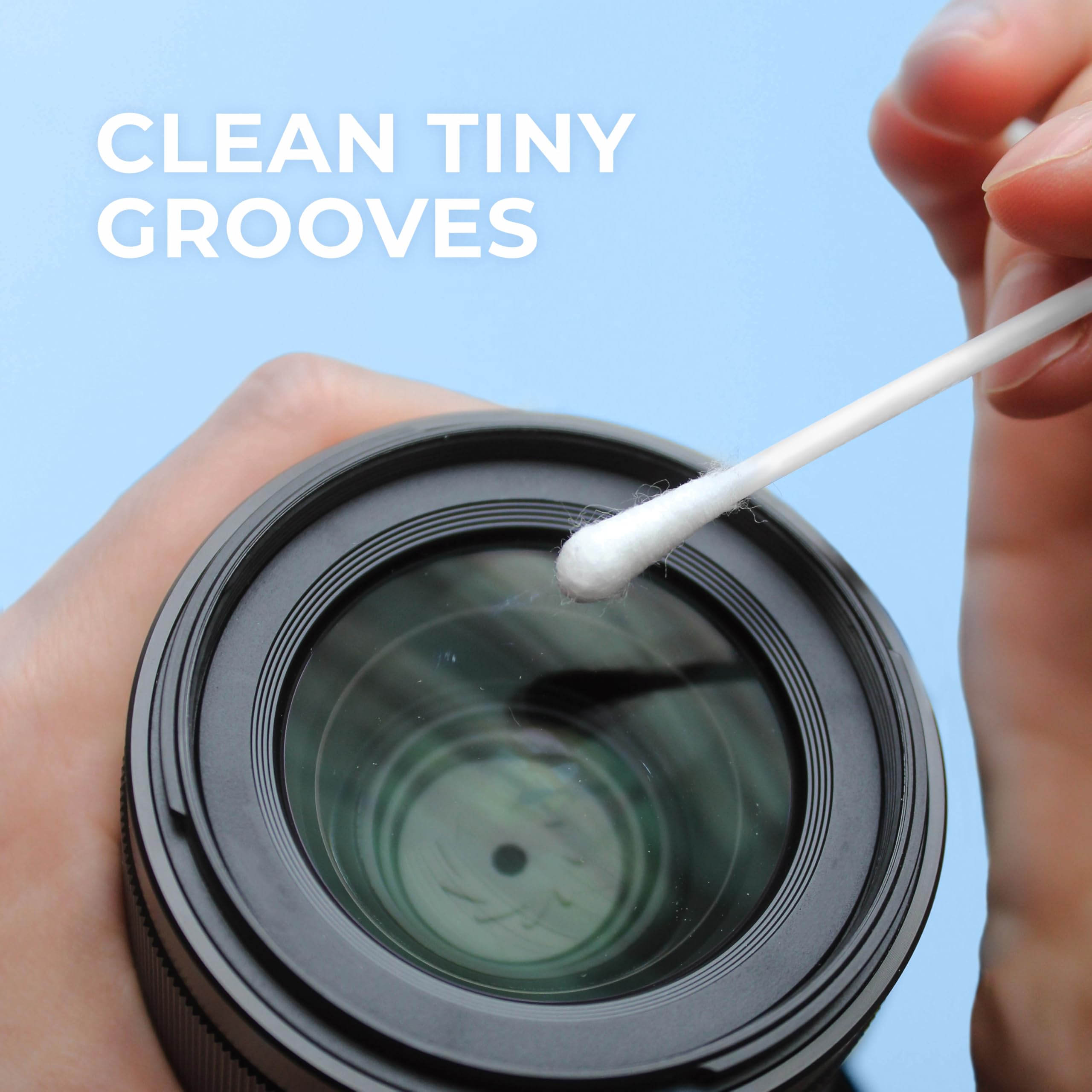 Q-tips removing debris from keyboard offering precise electronics cleaning