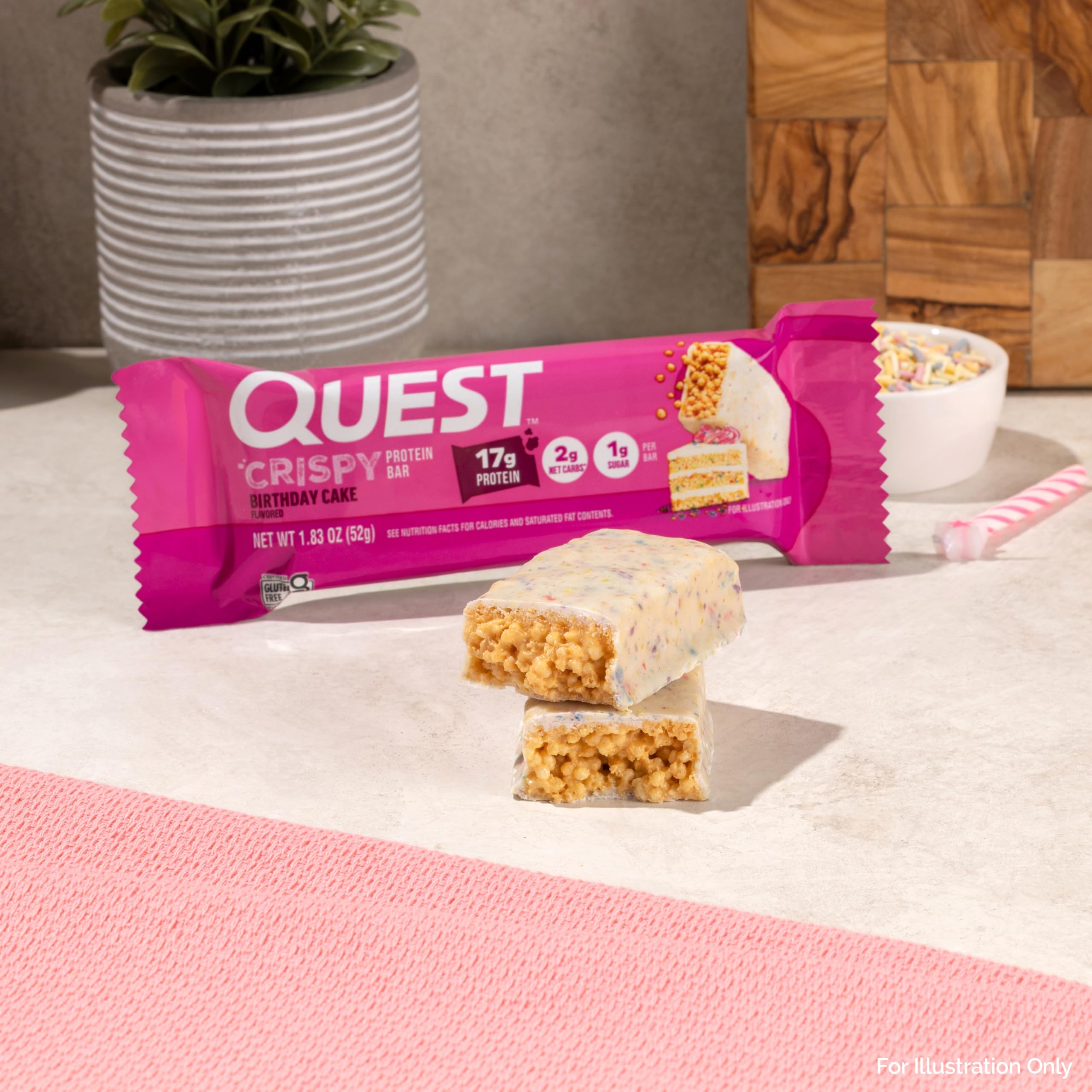 Quest barra junto a una mano para comparar tamaño y conveniencia de porción