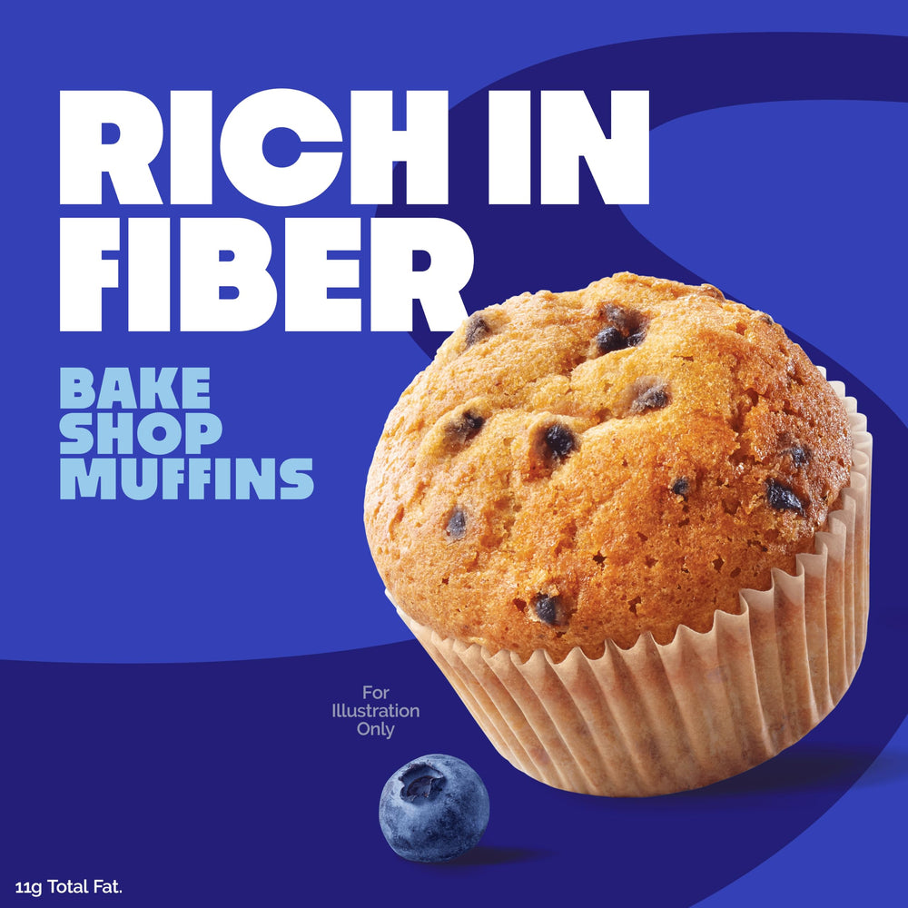 Porción abierta del Quest Blueberry Muffin mostrando arándanos integrados y humedad