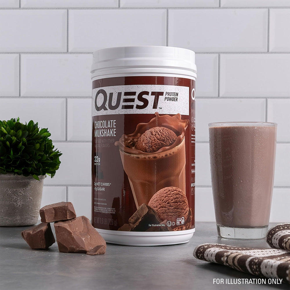 Prepared chocolate shake in a glass made with Quest providing a satisfying treat
