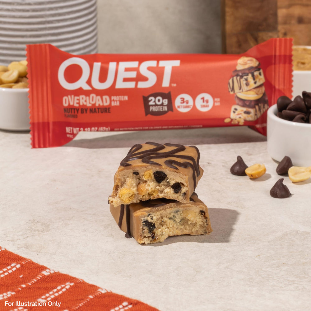 Quest Overload barra en mano muestra tamaño práctico y portable