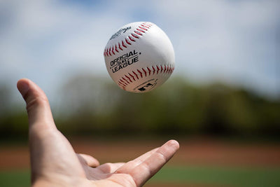 Rawlings baseball being swung at during batting practice for training