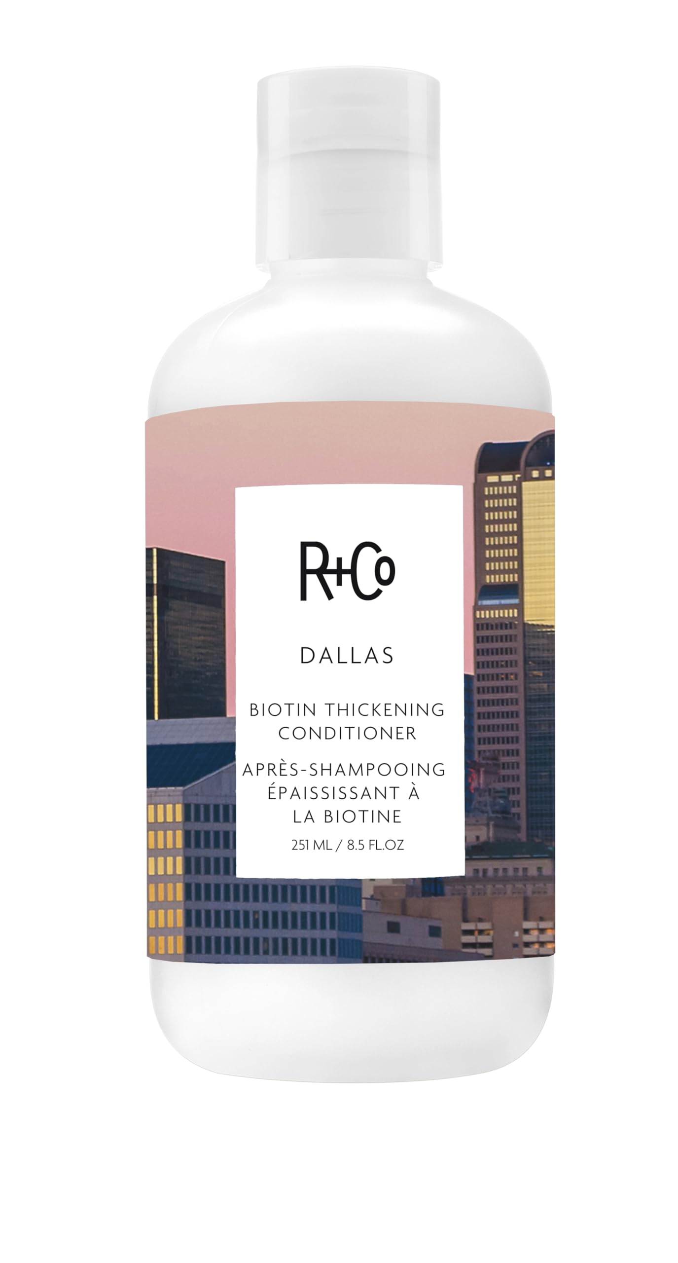 R+Co Dallas vista frontal del envase con diseño profesional y beneficio volumizante