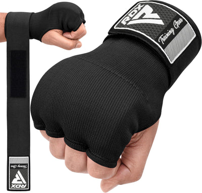 RDX guantes internos frente mostrando ajuste y protección