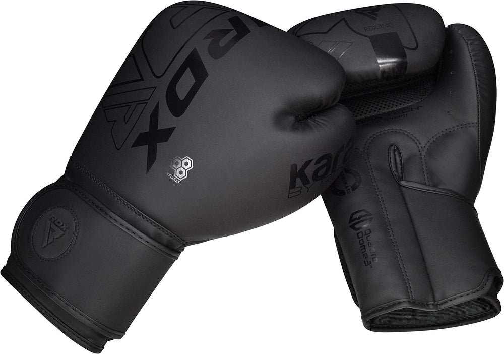 RDX guantes en padwork y sparring mostrando control y comodidad en entrenamiento